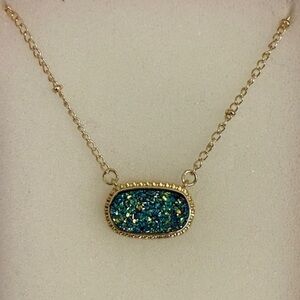 Elegant Gold plated women’s Necklace with Shimmery Green Pendant